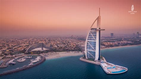 Burj al arab is shaped like a sail. Burj Al Arab Swim - Global Swim Series