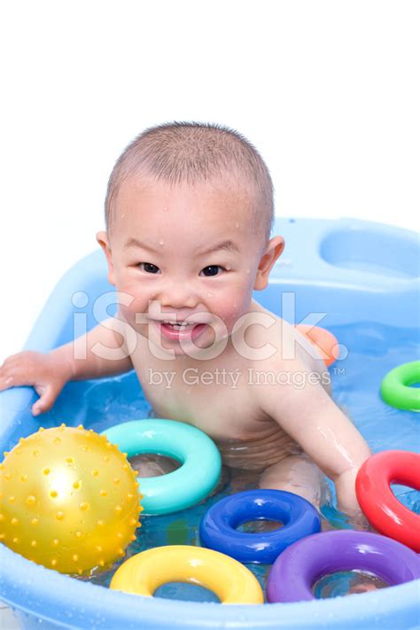 Very often he will urinate as soon as he touch after waiting a minute or two, transfer him to the bath. Baby Boy IN Bath Stock Photos - FreeImages.com