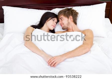 It's not possible to be this way all the time but you can carve out time to explore and have fun with your man. Young Lovely Couple Lying Bed Happy Stock Photo (Edit Now ...