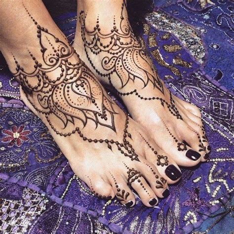 There is no harm in using it. henna foot tattoo, identical designs in brown, freshly ...