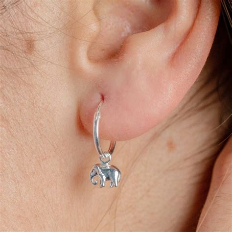 Check spelling or type a new query. Sterling Silver Elephant Charm Hoop Earrings By Lisa Angel ...