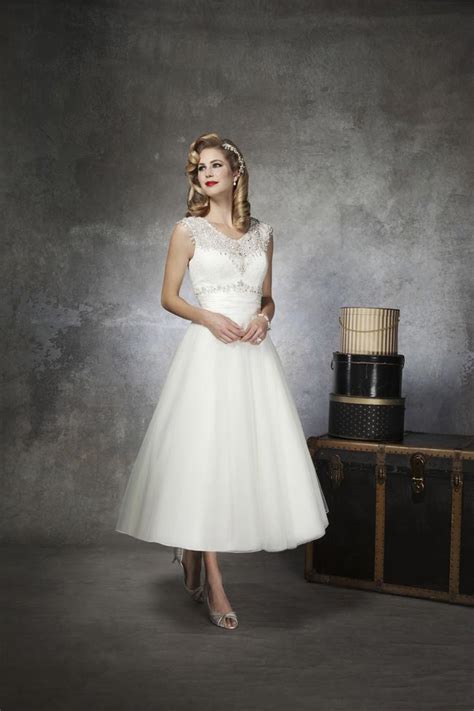 Wow i was so relieved i wasn't the only one who hated the idea of a cookie cutter poofy foofy wedding! 12 of the best 50s-style wedding dresses for 2013