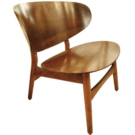 His work, along with a concerted effort from several of his manufacturers. Hans Wegner Shell Chair with Original Label at 1stdibs