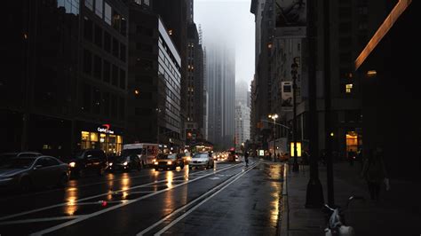 Also explore thousands of beautiful hd wallpapers and background images. Cars On Road Between Buildings HD Dark Aesthetic ...