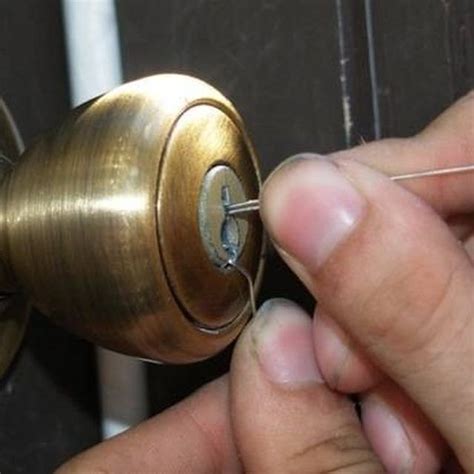 Stick your tension wrench or hex key and the flattened paperclip inside the keyhole. How to Open a Locked Door Using a Paperclip | Hunker ...
