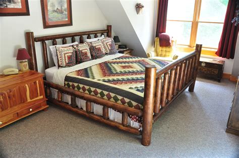 The properties they run are immaculate and top notch, and you are ensured a wonderful experience at all times. The loft bedroom at Whispering Woods Cabin has a king bed ...