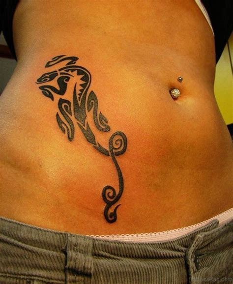 The tattoo design on the side of lower stomach steals the show. 46 Magnificent Tribal Tattoos On Stomach