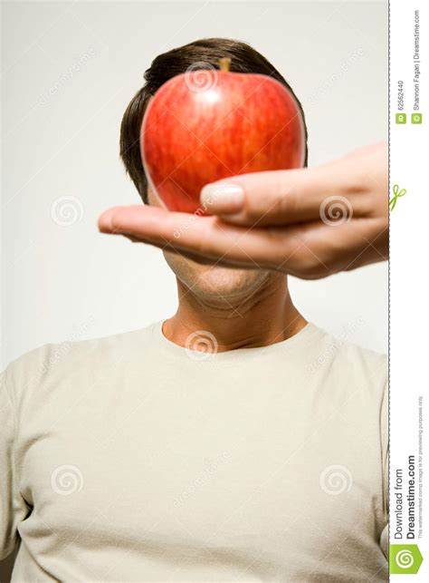 Image of apples, honeyed, fruitage. Woman Holding Apple Over Man's Face Stock Photo - Image of hispano, apple: 62562440