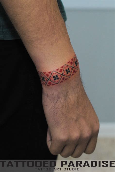tattoo-artist-oleg-rudenko,-kiev-ukraine-traditional-tattoo-cuff,-embroidery-tattoo,-cuff-tattoo