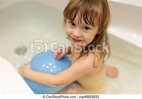 Hotels near les petites parisiennes, paris on tripadvisor: Little girl in a bathroom. Little girl sitting in a bath ...