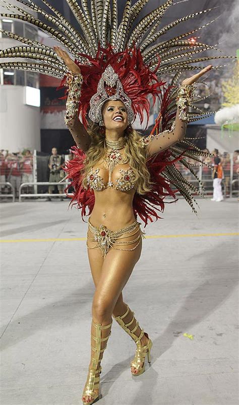 Welcome to the first 100% semba italian festival of ever. Parade ... stunning Brazilian dancer in samba carnival ...