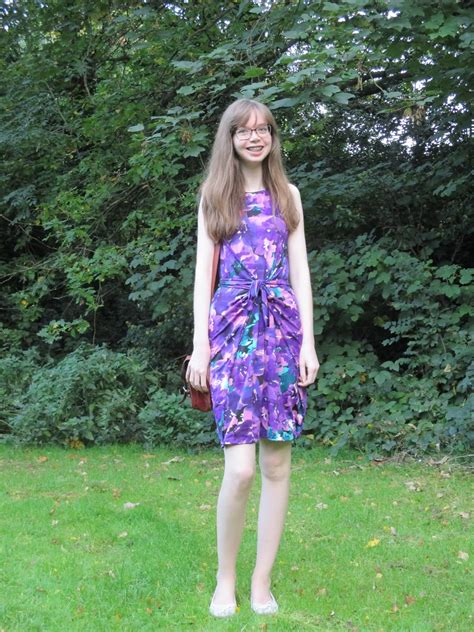 It features a sleeveless design with a round neckline. Lady Sewalot: Floral Jersey Kielo Wrap Dress