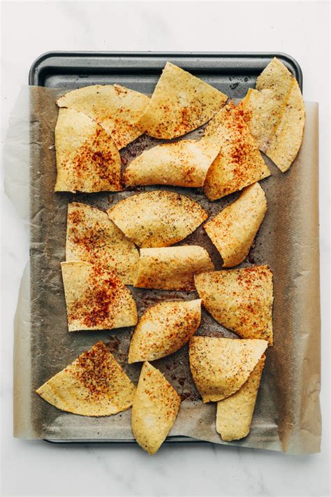 Spread the chips out in a single layer on two. How to make homemade oven baked tortilla chips from corn ...