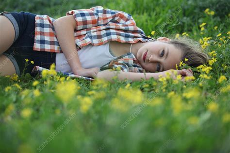 Send fresh flowers online to краснодар. Woman laying in field of flowers - Stock Image - F005/8759 ...