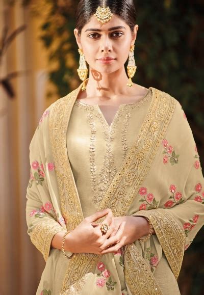 Make it as easy as well. beige silk embroidered palazzo style pakistani suit 56