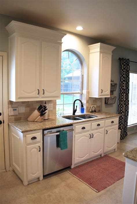 What color should you paint your kitchen cabinets? Off White Sherwin Williams Kitchen Cabinets / Painted ...