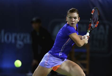 Simona halep of romania competes in the women's singles final against elise mertens of belgium during the wta prague open tennis tournament at tk. Simona Halep Photos Photos - WTA Dubai Duty Free Tennis ...