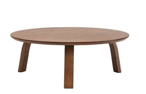 Optez pour notre célèbre table opium aux pieds. Table basse ronde bois chocolat clair NELLA - Miliboo