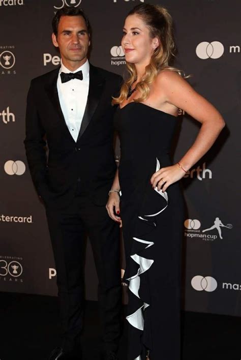 Roger federer of switzerland celebrates winning his singles finals match against alexander zverev. BELINDA BENCIC and Roger Federer at Hopman Cup New Years ...