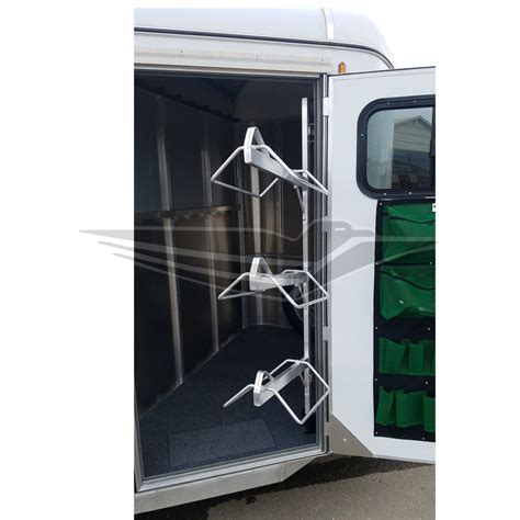 We debated putting the rack on the side of the door with the hinges to reduce warp on the door from the weight of the pads. Swing Out Saddle Rack, Aluminum | Saddle rack, Horse ...