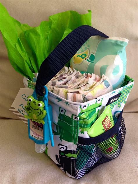 Items like cozy blankets, bibs, bottles and diapers make great gifts that are sure to be used on a daily basis. In need of a cute Baby Gift? The Little Carry All Caddy ...