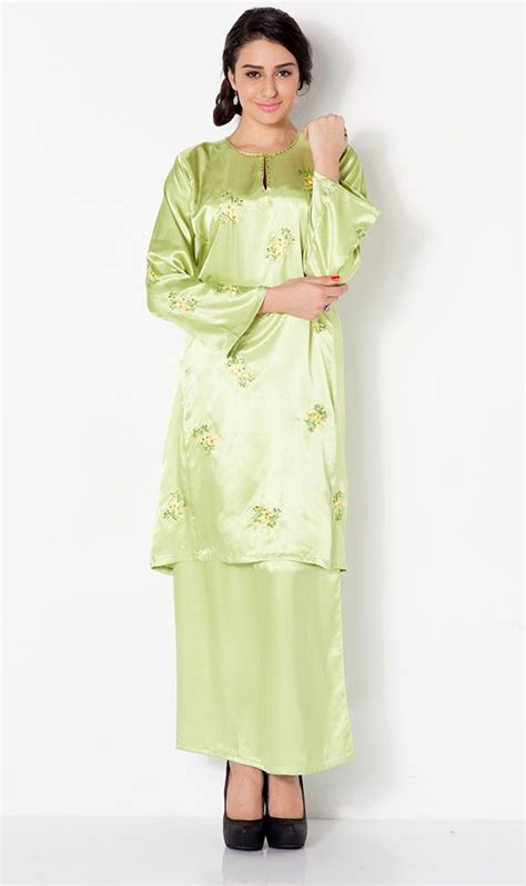 Latest baju kurung in malaysia. First Lady Plain satin Beaded Baju kurung