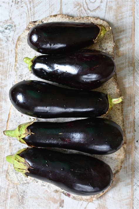 Mapo eggplant with baby bok choi, baby pea shoots and eggplant sformata. Italian Eggplant with Walnut Stuffing - Ciao Chow Bambina