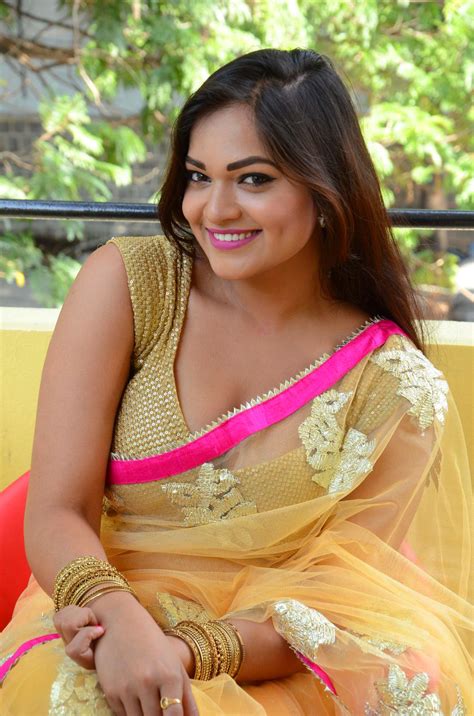 India is quite conservative so most indian girls dress relatively modestly. Ashwini Cleavage in Yellow Saree - South Indian Actress