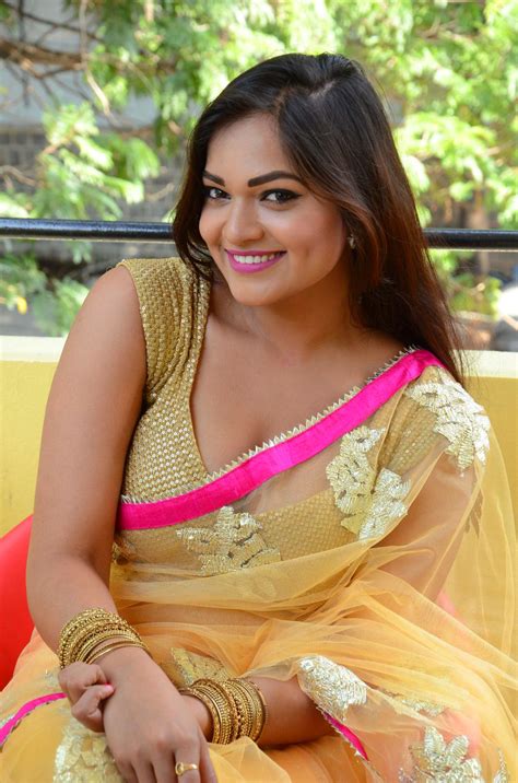 Really beauty and romance lies in indian saree style. Ashwini Cleavage in Yellow Saree - South Indian Actress