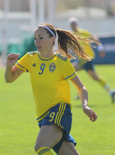 29 partidos disputados para la sueca y máxima goleadora. Kosovare Asllani running on the field : GirlsSoccer