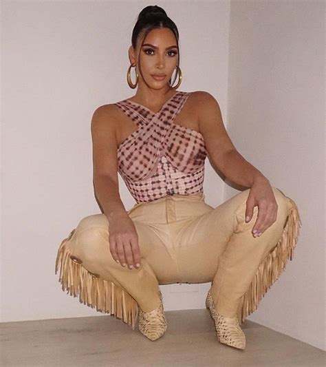 Kim Kardashian shocks fans with new red hair as her ...