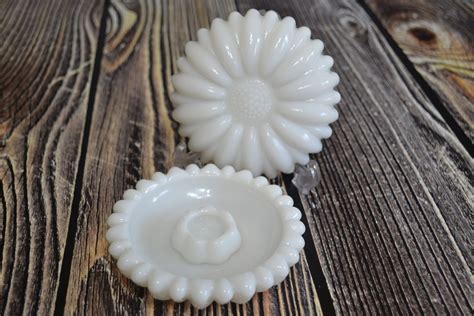 Other antique milk glass plates sport relief portraits of christopher columbus at their centers, and in 1908, plates were. Daisy Shaped Milk Glass Candle Holders by Hazel Atlas ...