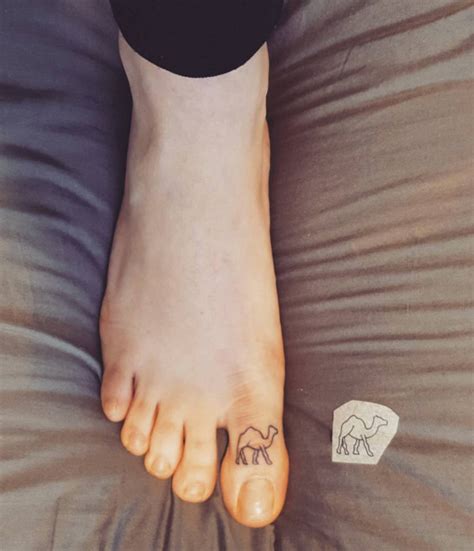 Camel tattoos on both toes. 60 Incredibly Tasteful Tiny Tattoo Designs - TattooBlend