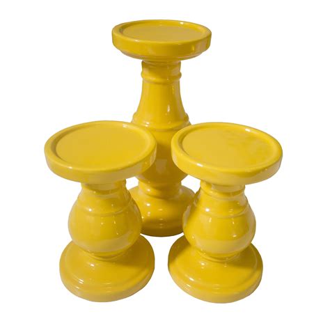 Never use this candleholder with any candles not enclosed in glass. Yellow Candle Holder Set | Lux Furniture Rentals