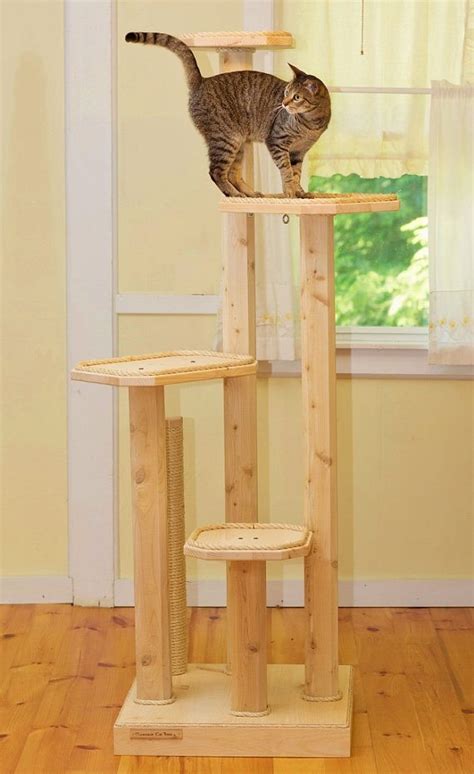 This article will cover natural indoor and outdoor deterrents for every scenario where cats are causing trouble. Cat Scratching Tree Furniture (A BUYERS GUIDE) | Cat Tree ...
