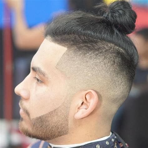 Maybe you would like to learn more about one of these? Lineup Undercut With Man Bun | Man bun haircut, Man bun ...