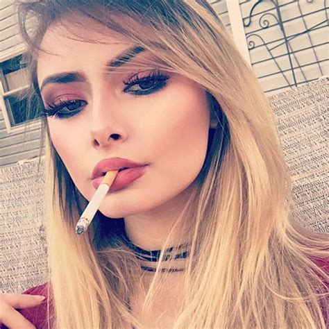 Non smoker masha is smoking two all white 120mm cigarettes outside. Pin on Lovely