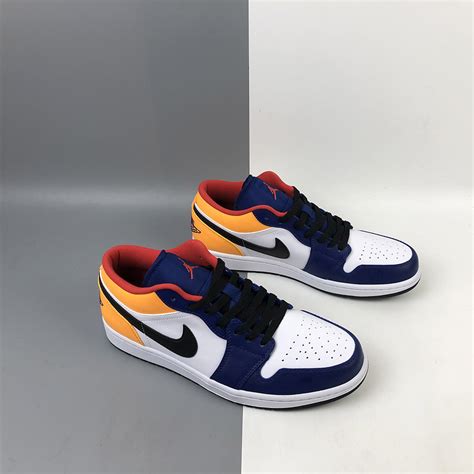 This new edition features white leather paneling while royal blue overlays add onto the build for a nice look. Air Jordan 1 Low Blue Yellow Orange For Sale - The Sole Line