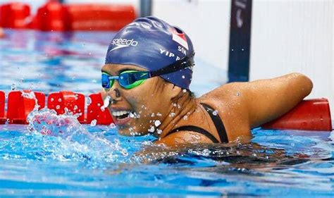 Gold medallist singapore's yip pin xiu celebrates with a national flag after the women's 100m backstroke swimming event during the tokyo . Paralympics champ Yip Pin Xiu bags second gold medal in ...