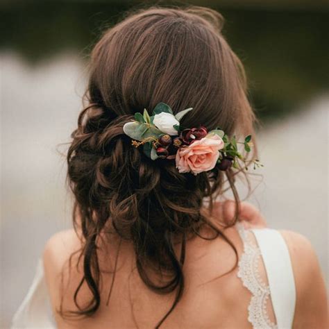 Pull your tresses into a loose plaited low bun, which will give the impression of an even fuller head of hair. 35 Chic & Messy Updo Hairstyles For Luxuriously Long Hair