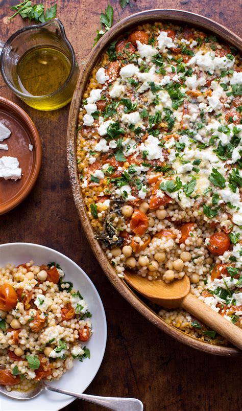 Toss the couscous with the broccoli, chickpeas, walnuts, capers, and. Pearl Couscous With Creamy Feta and Chickpeas | Recipe ...