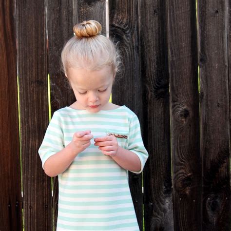 This kids mohawk highlights the child's initials with a stellar accent. how to make a kids ballerina bun (With images) | Little ...