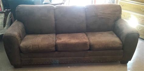 The sofa has three sections, two three seat sections and a small section that joins the other. UHURU FURNITURE & COLLECTIBLES: SOLD **REDUCED** Brown ...