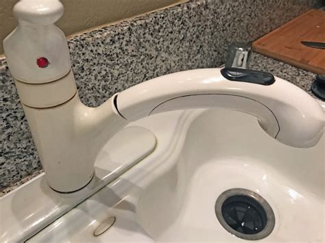 • more info on the faucet: Before Replacing a Kitchen Faucet: Pull Down vs Pull Out