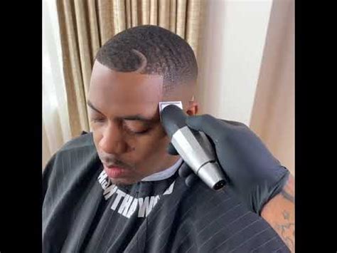 Low fade haircut with a shaved side part. Nas " Signature Fade With the Bevel Blade" - YouTube