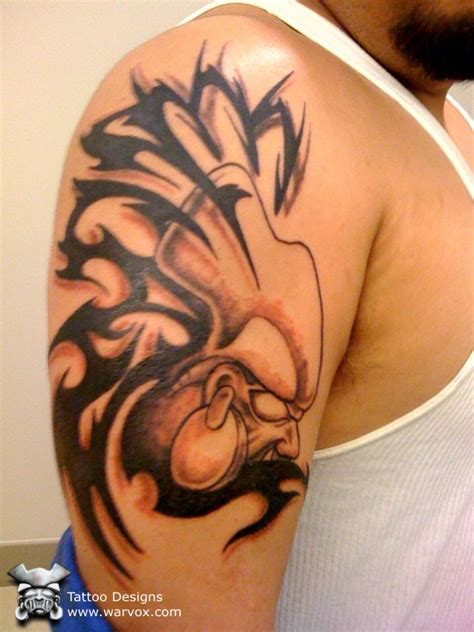 Ouroboros tattoos may represent different concepts, including: Warvox Tattoo Photo Gallery | Mayan Warrior Tribal