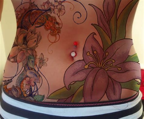 Because of their circular shape, most people place their mandala tattoos in the center of the stomach. Beautiful flowers stomach tattoo - | TattooMagz › Tattoo ...