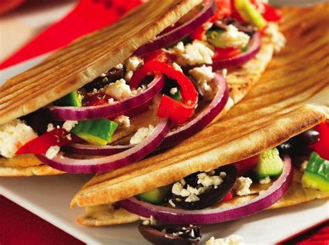 This panini can be grilled in a pan or put in a panini grill. Greek Veggie Panini | Cookstr.com