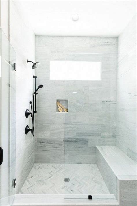 Want a new look for your shower fixtures? Bathroom Shower marble shower with herringbone floor matte ...