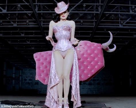 Bull riding, rodeo event in which the contestant attempts to ride a bucking bull for eight seconds while holding with one hand a braided rope made of nylon or manila that is wrapped around the animal's. Dita Von Teese bares her burlesque body as she ride a ...